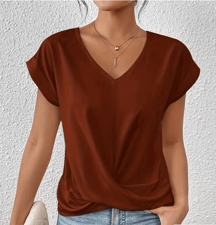 Stylish women's short sleeve V-neck tunic top featuring a flattering design for all-day comfort.