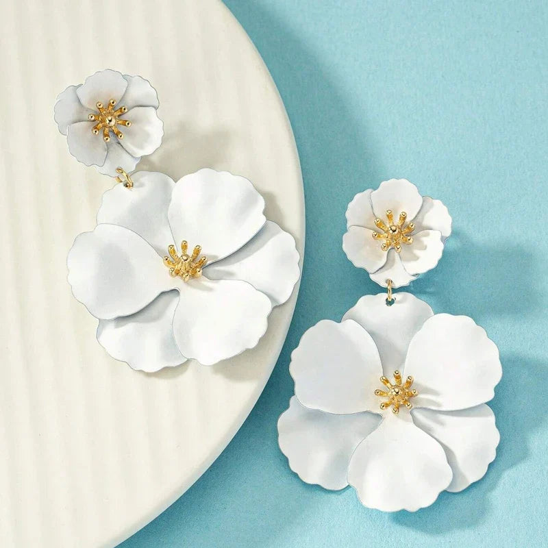 Elegant gold-plated Fleura Cascade fuchsia & white floral drop earrings for women, a true statement accessory.