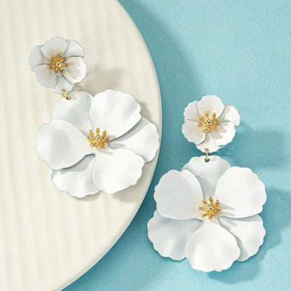 Elegant gold-plated Fleura Cascade fuchsia & white floral drop earrings for women, a true statement accessory.