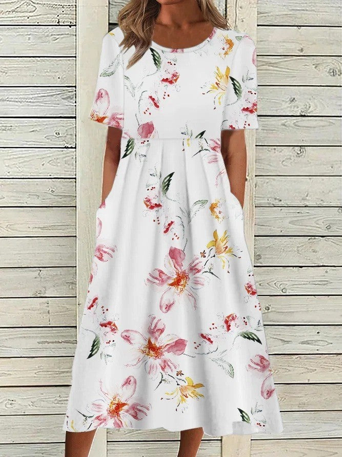 Elegant women's floral A-line midi dress with a round neck and short sleeves. Great for versatile spring/summer casual wear.