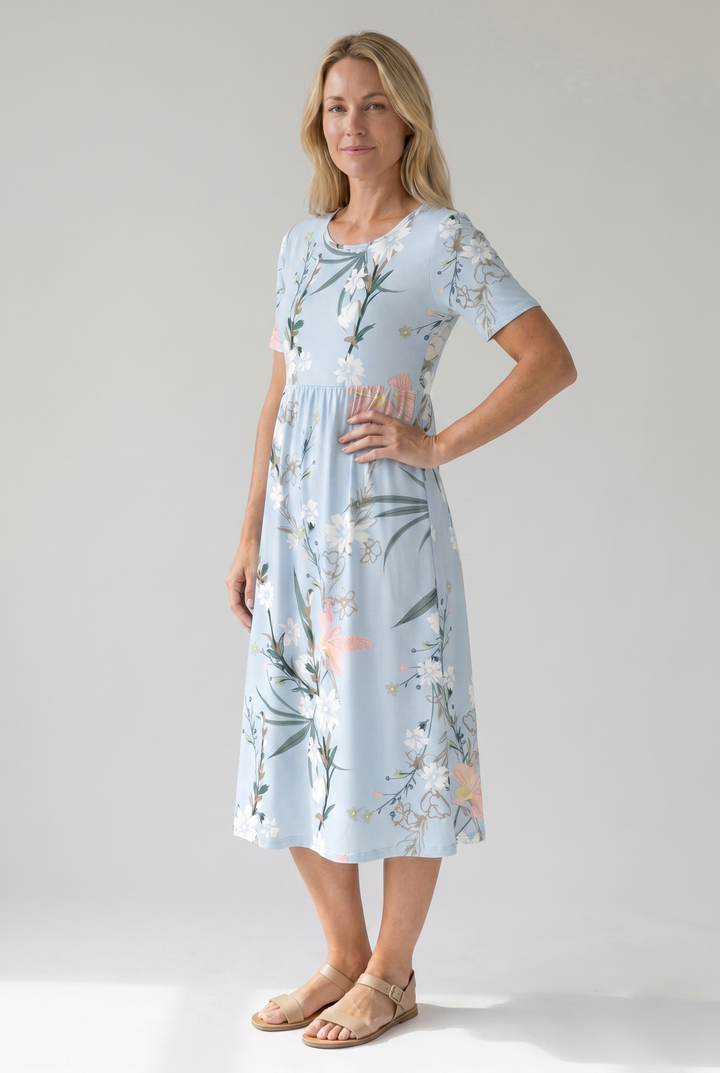 Comfortable women's floral printed A-line midi dress. Round neck, short sleeve, perfect for everyday spring wear.