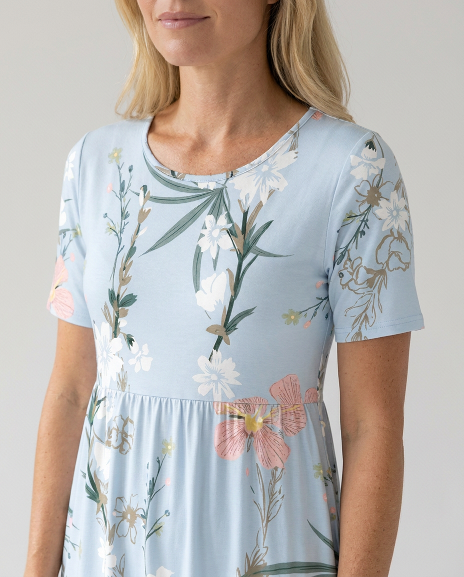 Vibrant women's floral A-line midi dress. Round neck, short sleeve. An elegant, versatile piece for women's fashion.