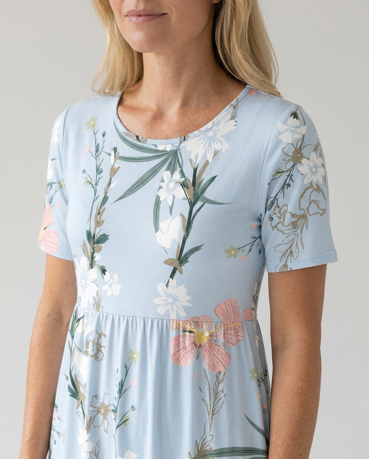 Vibrant women's floral A-line midi dress. Round neck, short sleeve. An elegant, versatile piece for women's fashion.