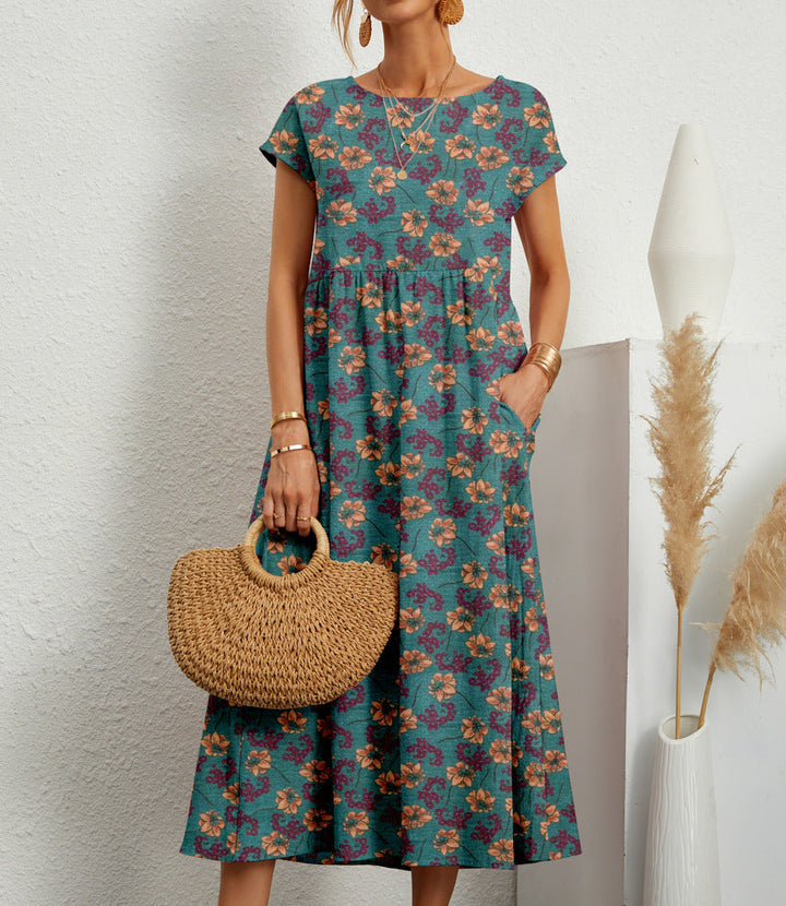 Feminine short sleeve floral A-line dress for women, featuring a vibrant print for effortless summer style.