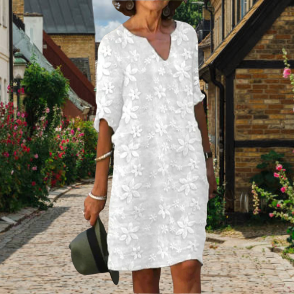 Women's floral appliqué midi dress with notch neck & 3/4 sleeves, perfect for casual summer wear.