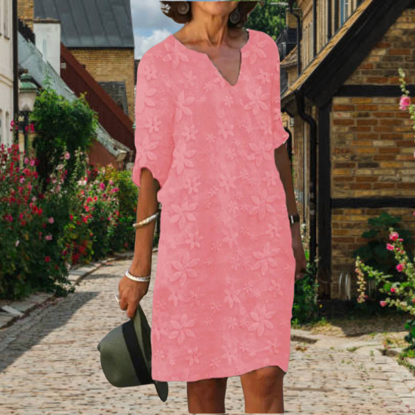 Textured women's casual midi dress, 3/4 sleeves, and beautiful floral appliqué for summer style.