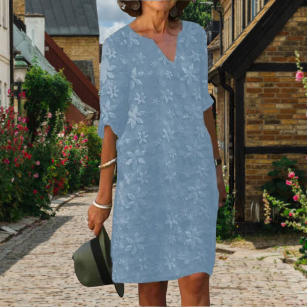Stylish women's floral midi dress, 3/4 sleeve notch neck design, ideal versatile summer attire.