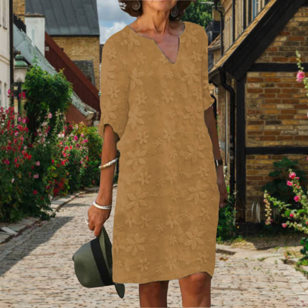 Elegant women's summer dress: floral appliqué, notch neck, 3/4 sleeves. A comfortable casual midi.