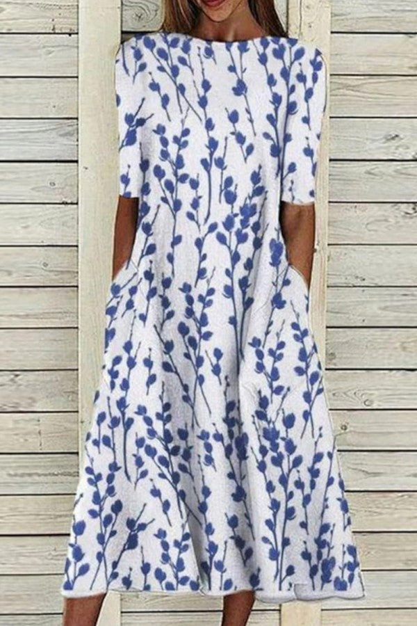 Women's floral blue half sleeve crew neck midi dress, comfortable & versatile for summer casual wear.