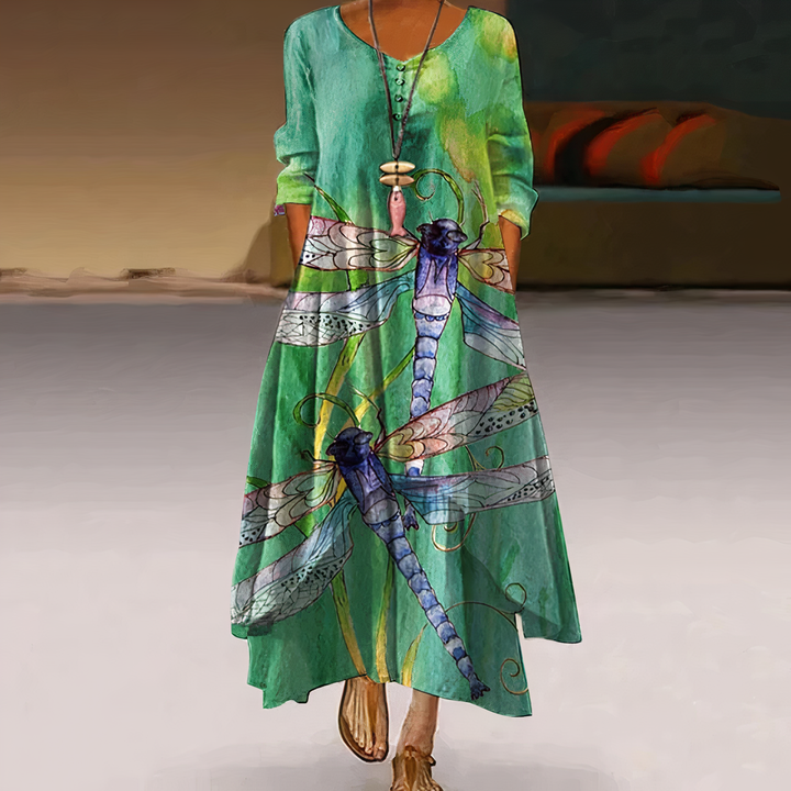 Versatile women's floral long sleeve maxi dress styled for casual spring/summer, featuring V-neck and pockets.