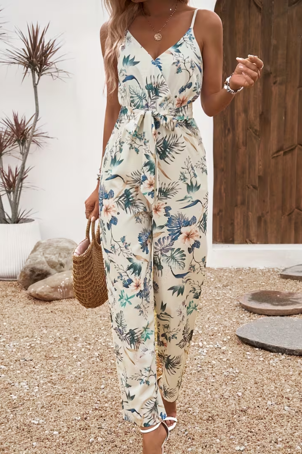 Women's floral cami jumpsuit with tie waist, perfect for stylish summer casual or vacation outfits.