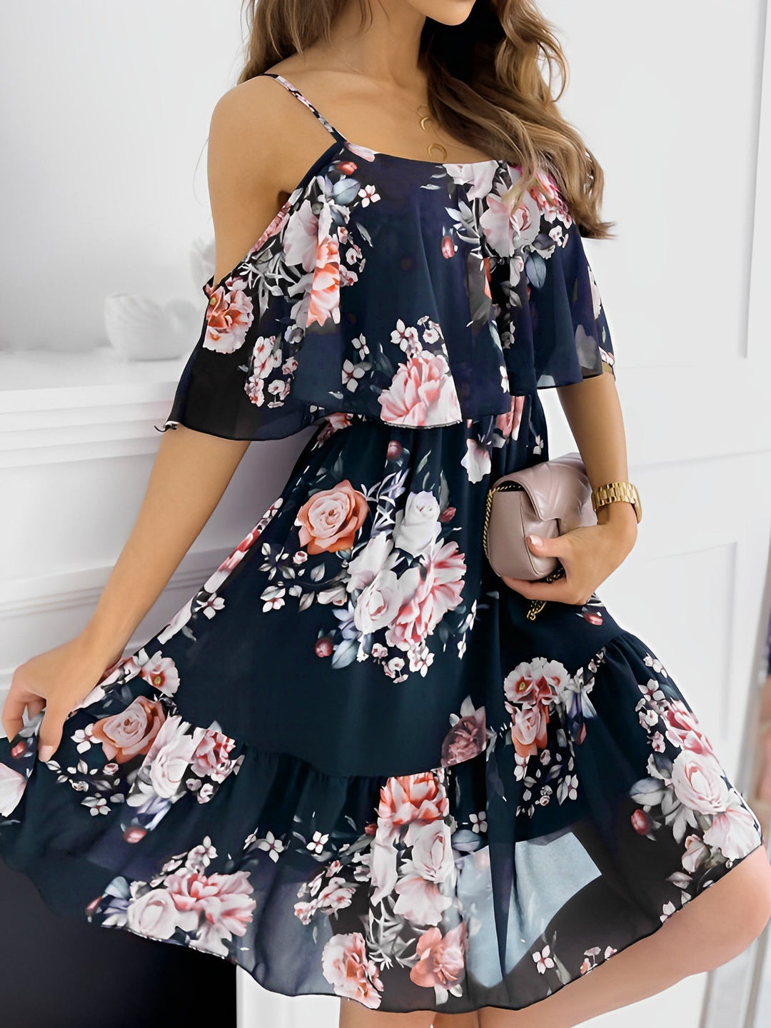 Chic floral print cold shoulder mini dress for women, offering a stylish, feminine look.