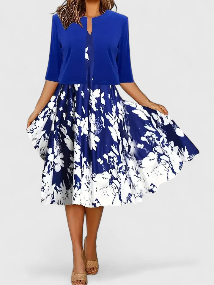 Floral colorblock A-line midi dress, women's three-quarter sleeve, chic notch neck design.