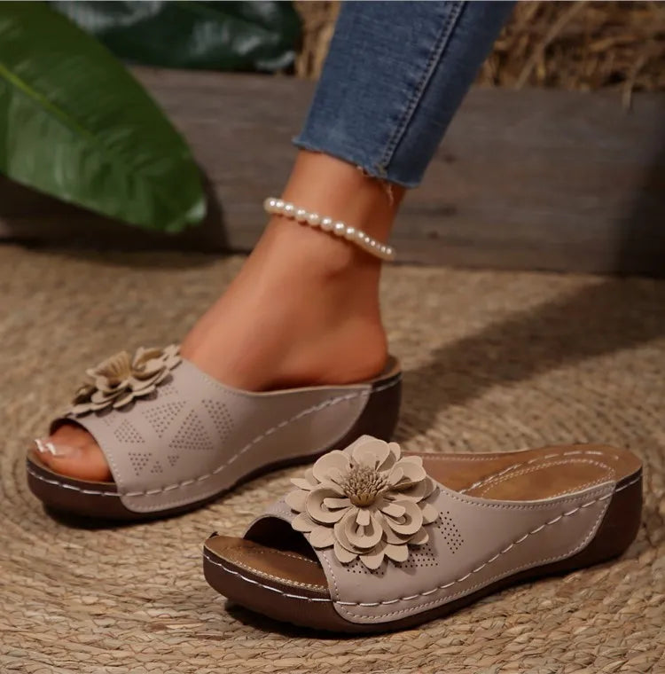 Simple slip-on floral sandals for women, flat, comfy, and casual summer shoes.