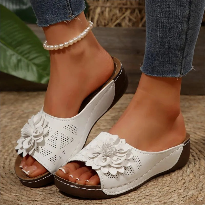 Chic women's floral comfort slide sandals, perfect for warm weather, casual elegance.
