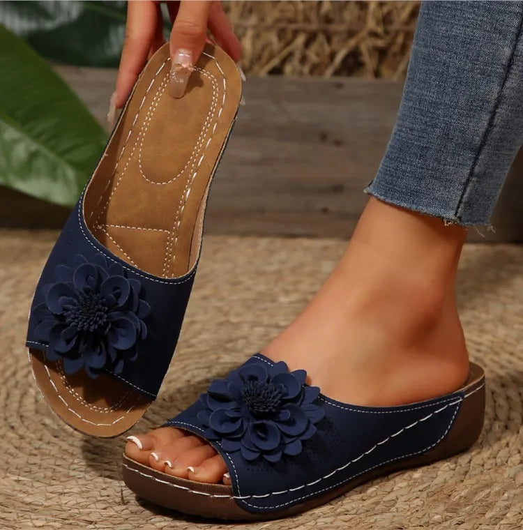 Top view: Women's floral comfort slide sandals, great for casual outfits & beach days.