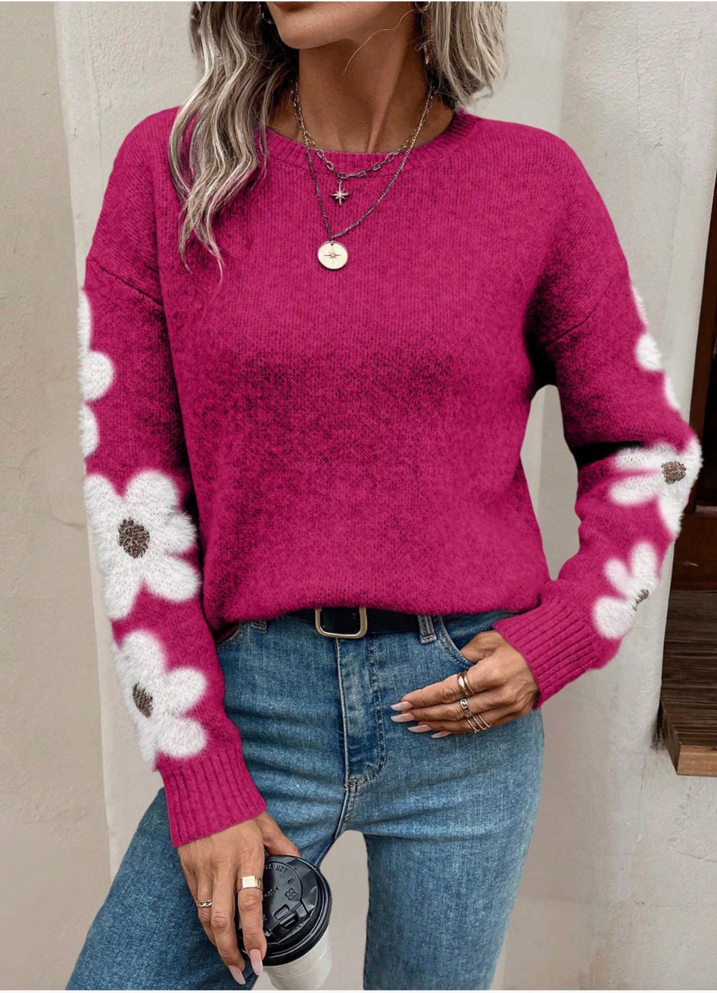 Women's elegant floral print knit sweater, featuring a comfortable drop shoulder and relaxed fit.