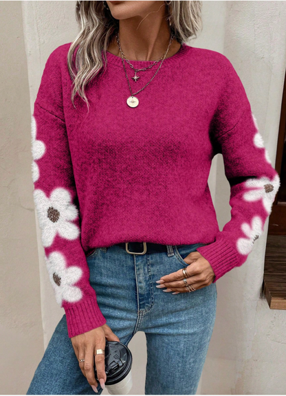 Women's elegant floral print knit sweater, featuring a comfortable drop shoulder and relaxed fit.