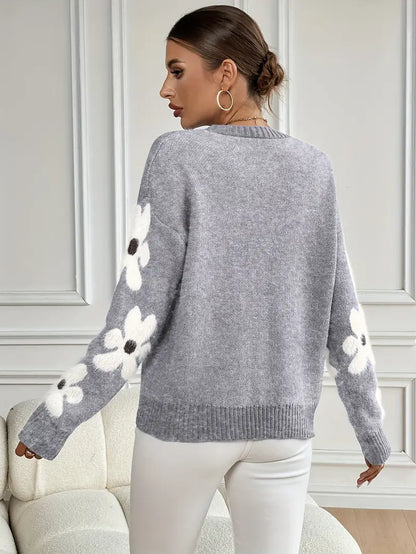 Comfortable women's floral drop shoulder knit sweater, perfect for everyday casual and relaxed fashion.