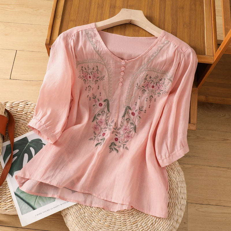 Elegant women's long sleeve floral embroidered top, relaxed fit, comfortable & versatile for everyday wear.