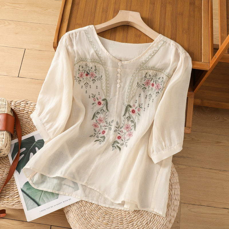 Casual chic women's floral embroidered V-neck blouse, relaxed fit, long sleeve. Perfect versatile spring top.