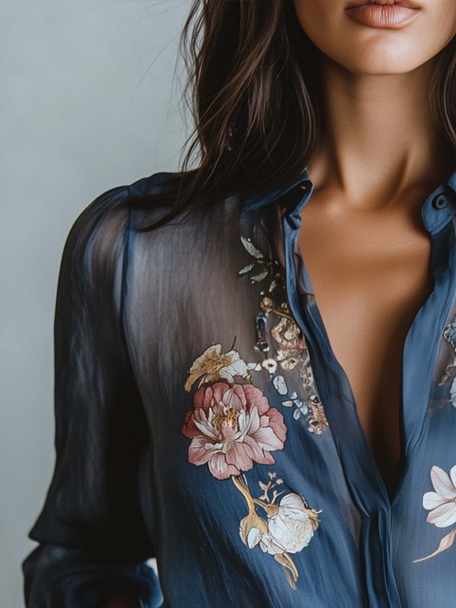 Stylish women's sheer sleeve blouse with beautiful floral embroidery, offering a sophisticated and feminine look.