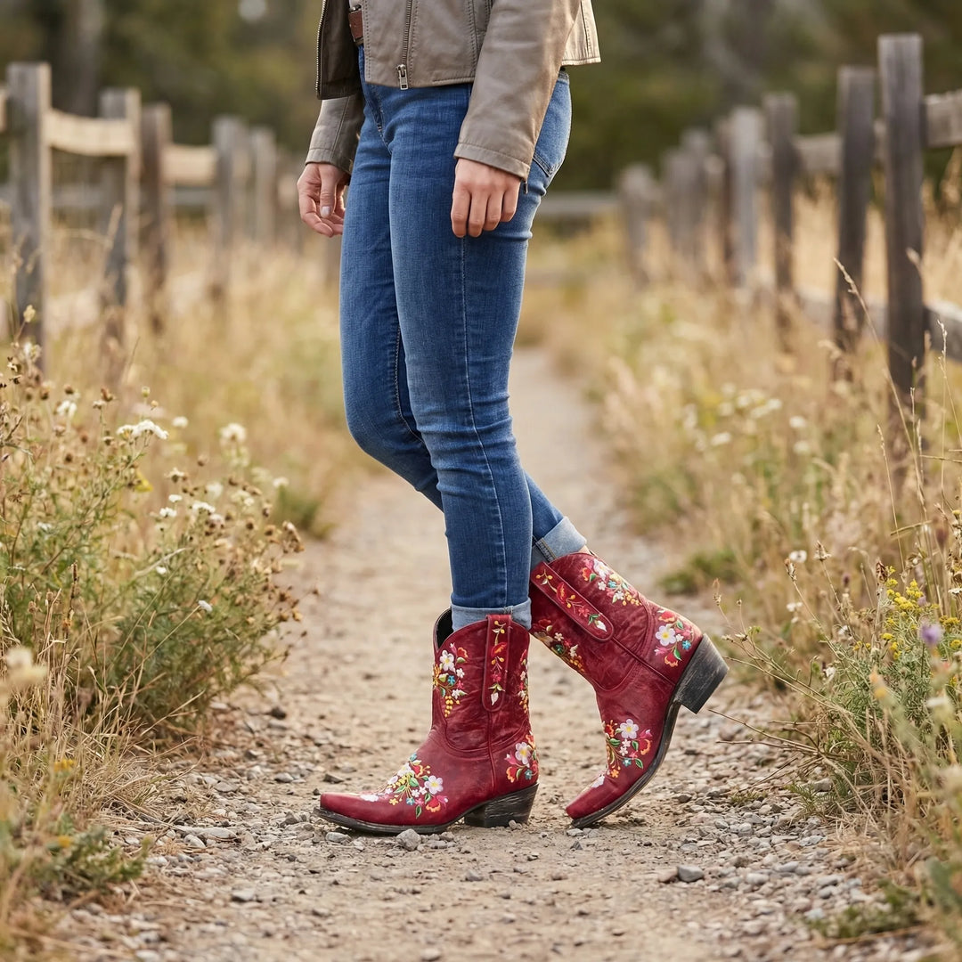 Women's floral embroidered western ankle boots, intricate stitching. Perfect for cowgirl style & country fashion.