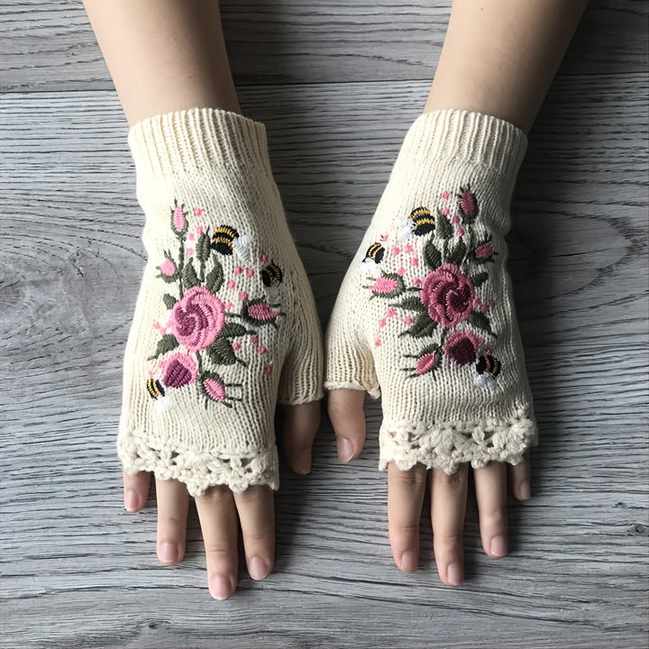 Women's floral fingerless knit gloves, perfect for winter fashion. Embroidered boho style, warm & chic.