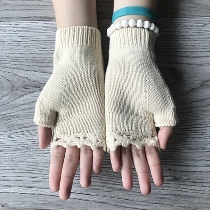 Embroidered floral fingerless knit gloves for women. Boho style winter accessory, warm & fashionable.