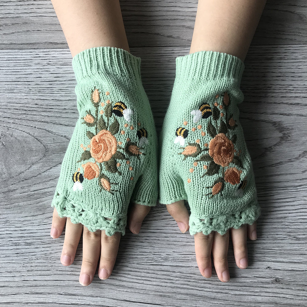 Stay warm with these women's floral fingerless knit gloves. Embroidered detail, ideal for winter accessories.
