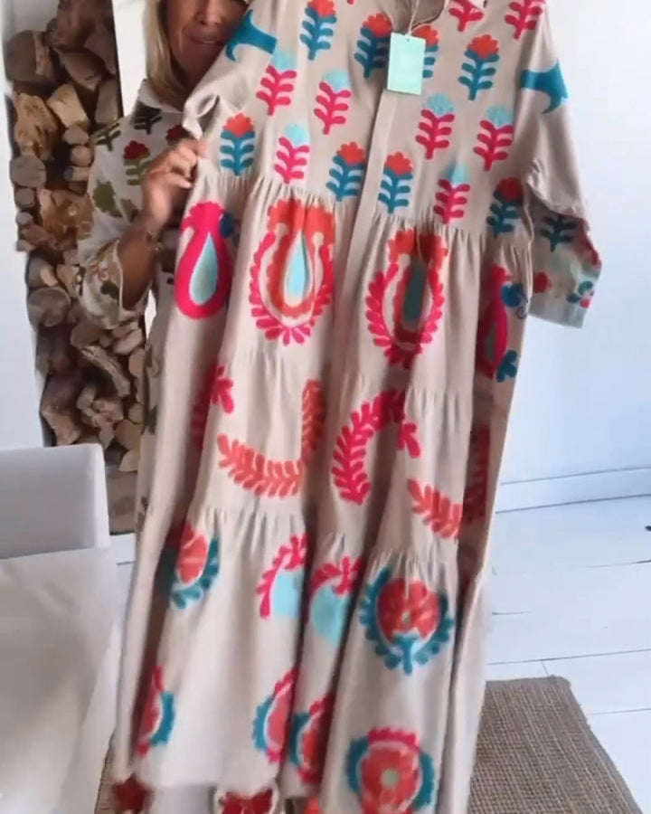 Vacation-ready women's floral graphic midi dress with a flattering A-line cut & smart lapel collar.