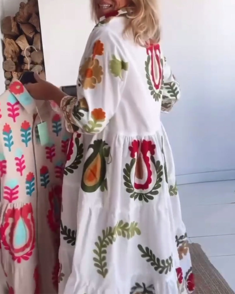 Spring women's midi dress: beautiful floral graphic print, A-line shape, and chic lapel collar.