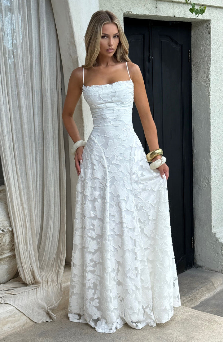 Flowy women's floral maxi dress, A-line cut, with a beautiful waterfall neckline and delicate lace-up back.