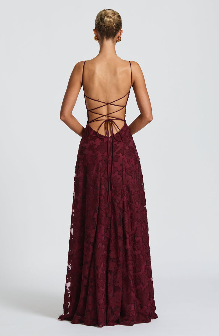 Vibrant floral print maxi dress for women, with a sophisticated waterfall neckline and lace-up back.