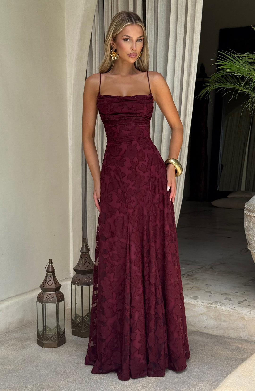 Elegant women's A-line floral maxi dress with a flattering cowl neck and stylish lace-up back.
