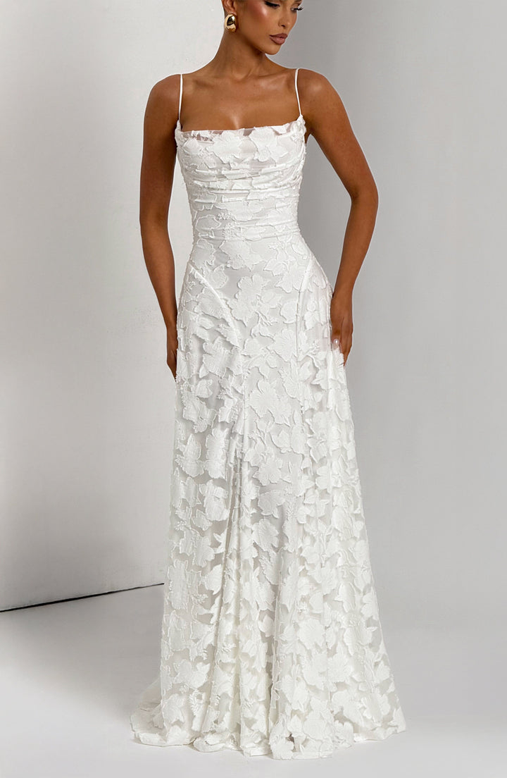 Full-length view of women's floral maxi dress with graceful waterfall neckline, perfect for warm weather.
