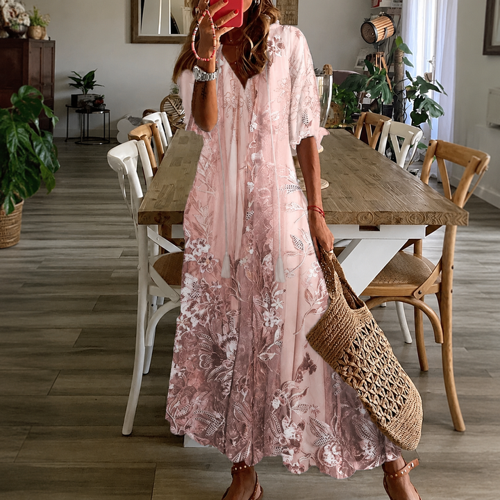 Women's floral maxi dress with split neck & half sleeves, perfect for summer garden parties or casual wear.