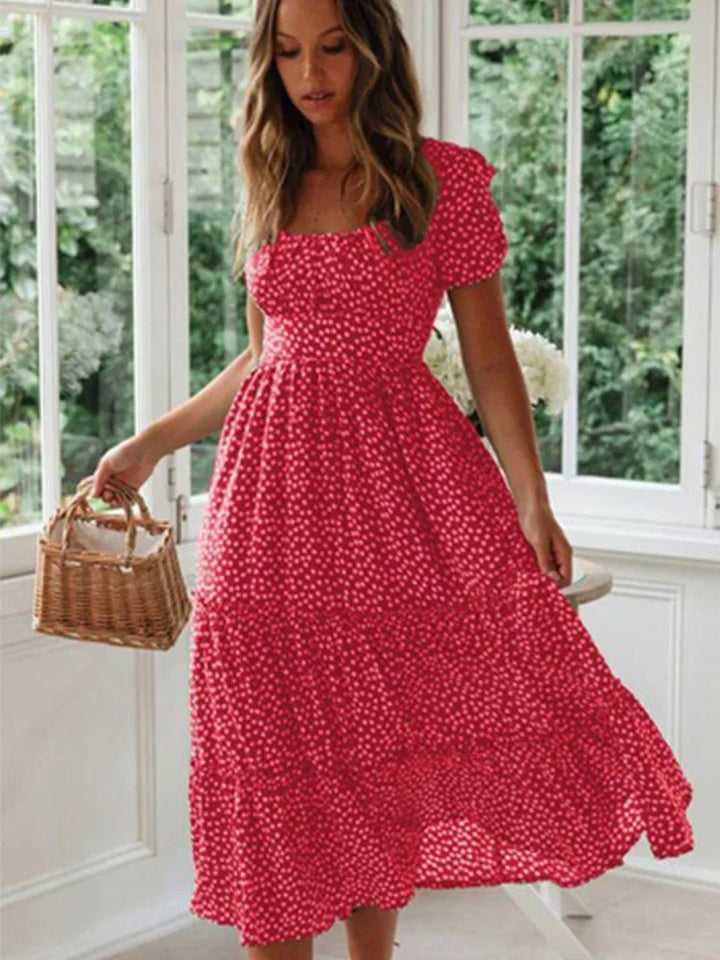 Women's smocked floral maxi dress, vintage style, flowy, puff sleeves. Ideal for summer, beach, or vacation outfits.