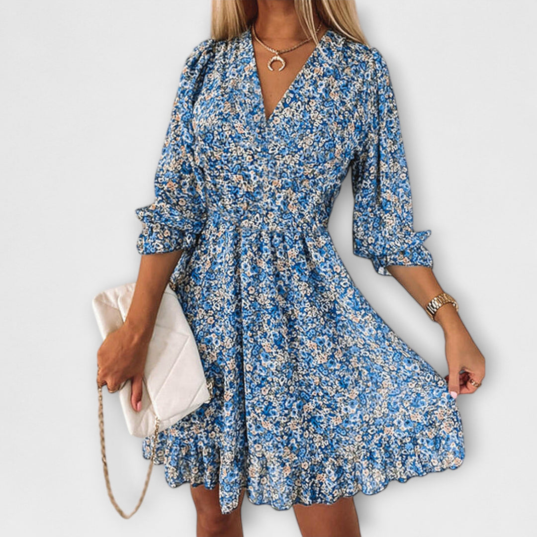 Comfortable green floral summer dress for women with puff sleeves & a flattering A-line silhouette.