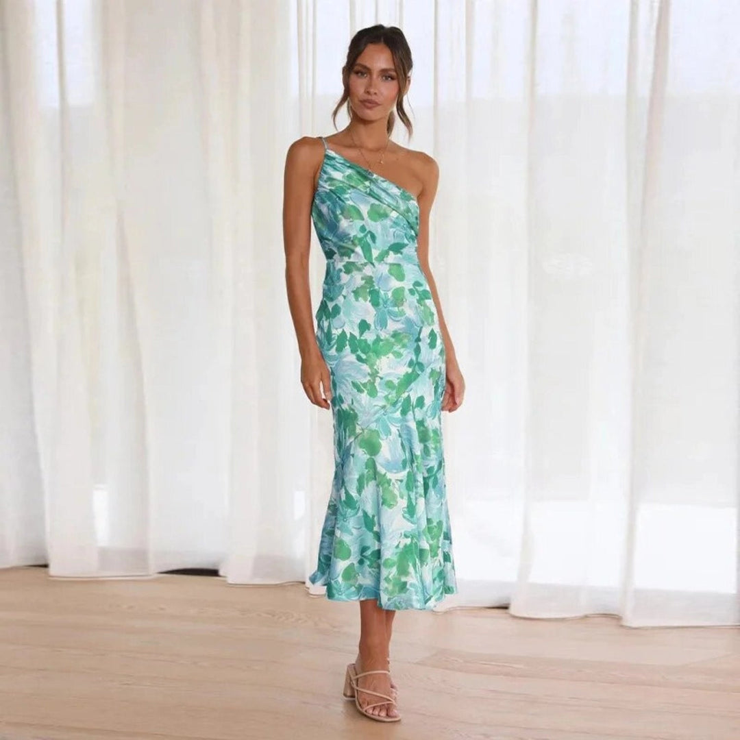 Chic women's floral one-shoulder midi cocktail dress. Ideal for summer weddings & elegant parties.