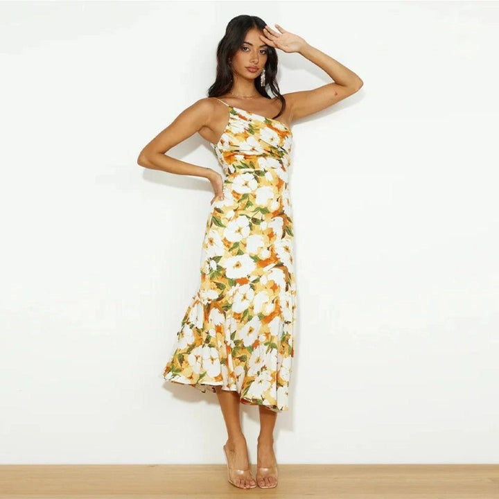 Sophisticated women's one-shoulder floral midi dress, designed with a flattering bias cut & fluted hem.