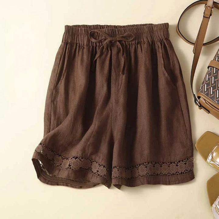 Light and comfortable women's floral elastic waist shorts, essential for summer outfits and beach days.