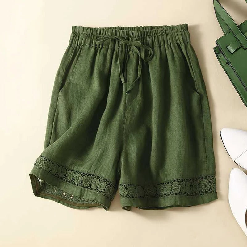 Women's casual floral elastic waist shorts, perfect for a relaxed summer look or comfortable vacation wear.