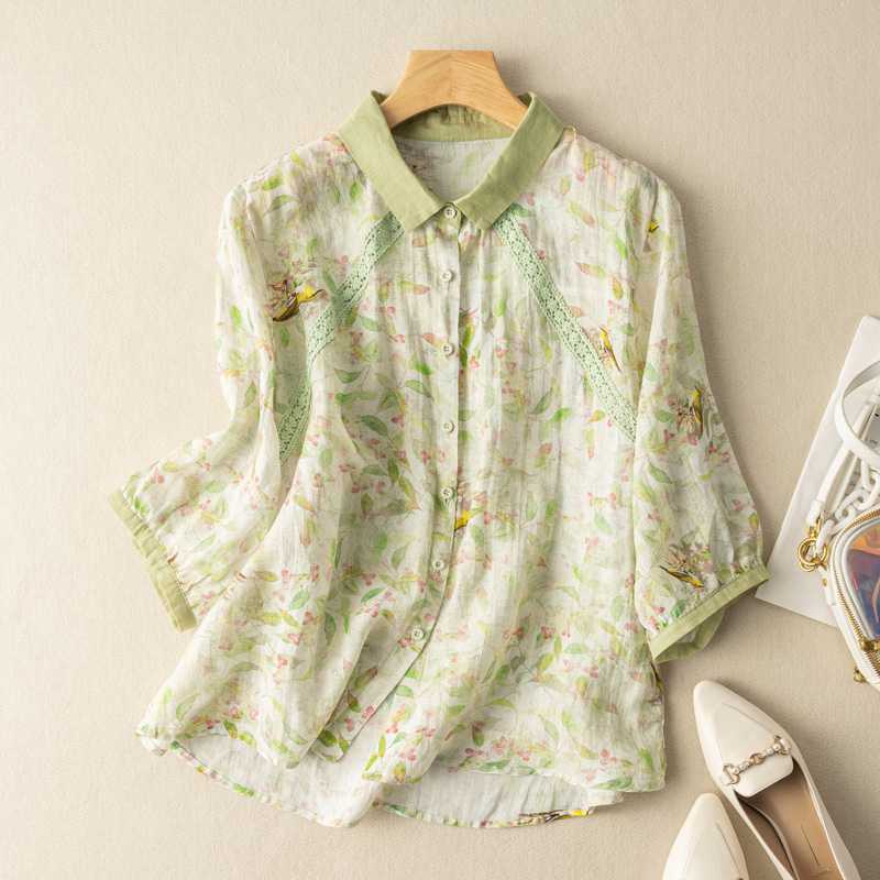 Elegant women's summer blouse with vibrant floral print & intricate lace. Ideal for leisure wear or spring outfits.