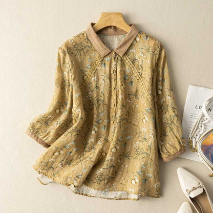 Artistic floral print button-down shirt for women, featuring exquisite lace details. Versatile spring/summer fashion.