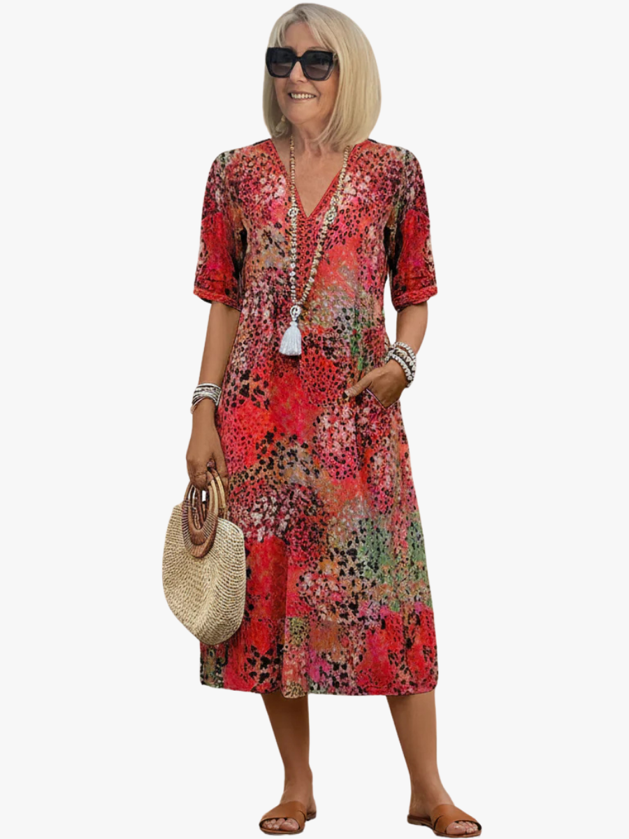 Women's floral print midi dress, A-line, V-neck, perfect for spring & summer casual wear.