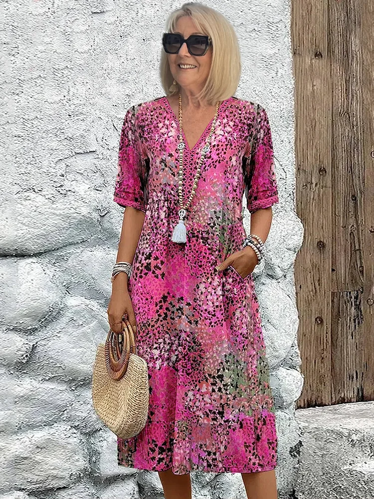 Chic spring collection women's midi dress with vibrant floral print, comfortable & stylish for daily wear.