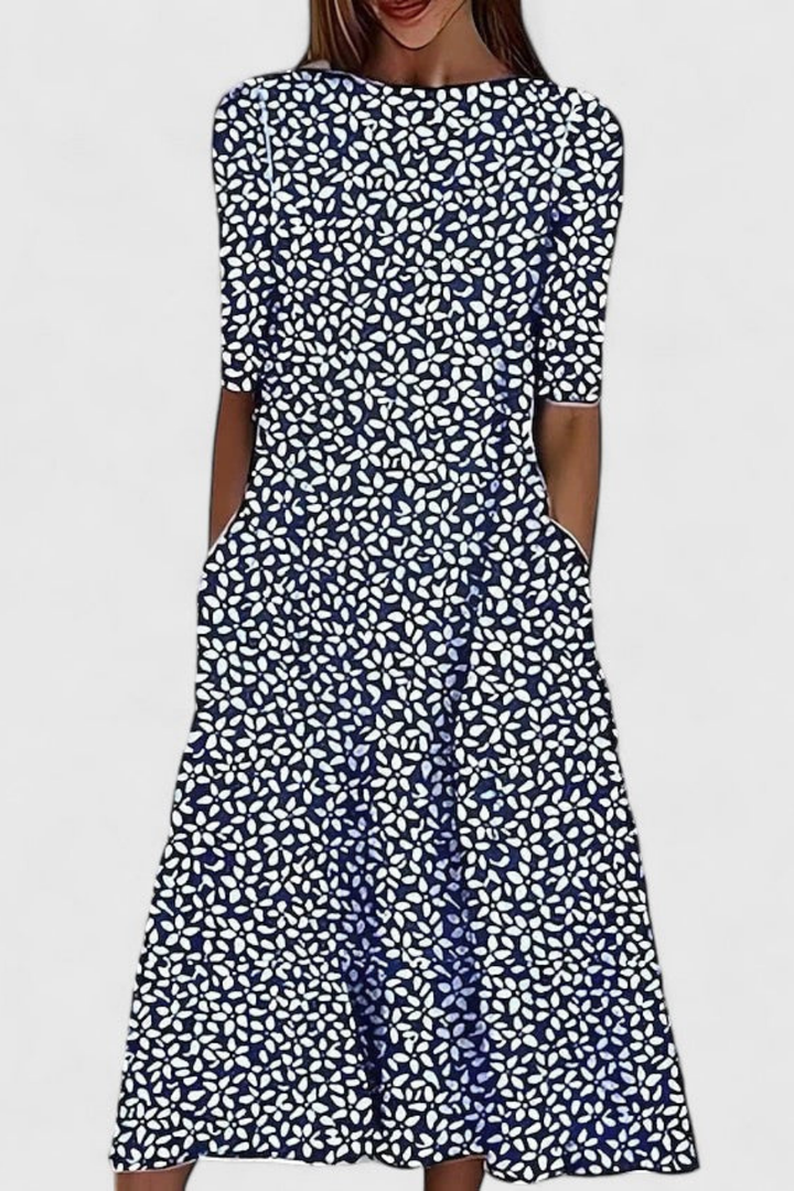 Casual women's floral midi dress, A-line fit, short sleeves, round neck & pockets for comfortable everyday summer style.