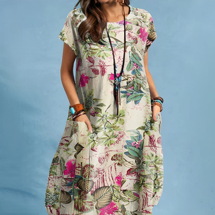 Flowy women's floral midi dress with short sleeves & side pockets. Ideal for summer vacation or everyday comfort.