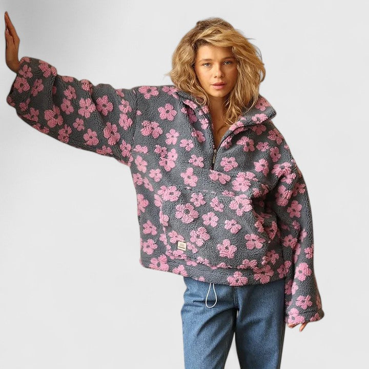 Comfortable women's floral quarter-zip sweater, a stylish pullover perfect for casual loungewear.